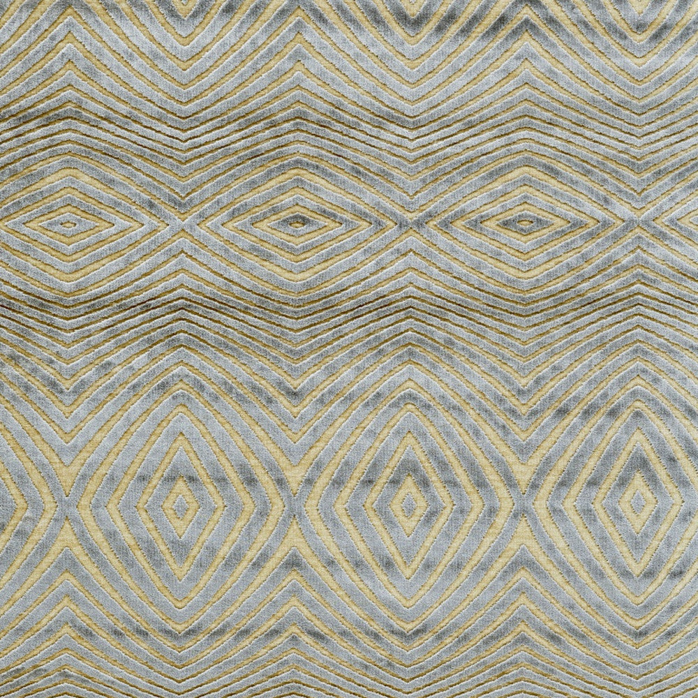5' X 8' Tan and Gray Abstract Power Loom Area Rug