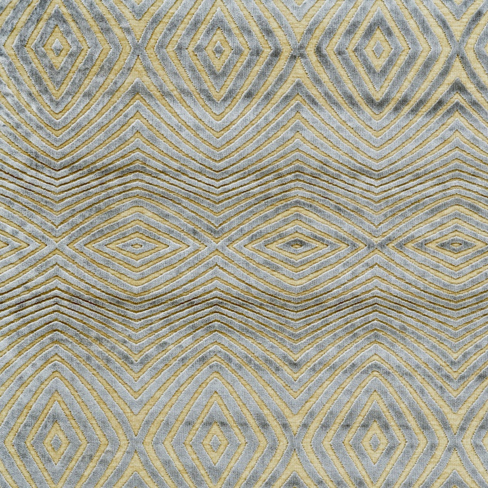 5' X 8' Tan and Gray Abstract Power Loom Area Rug
