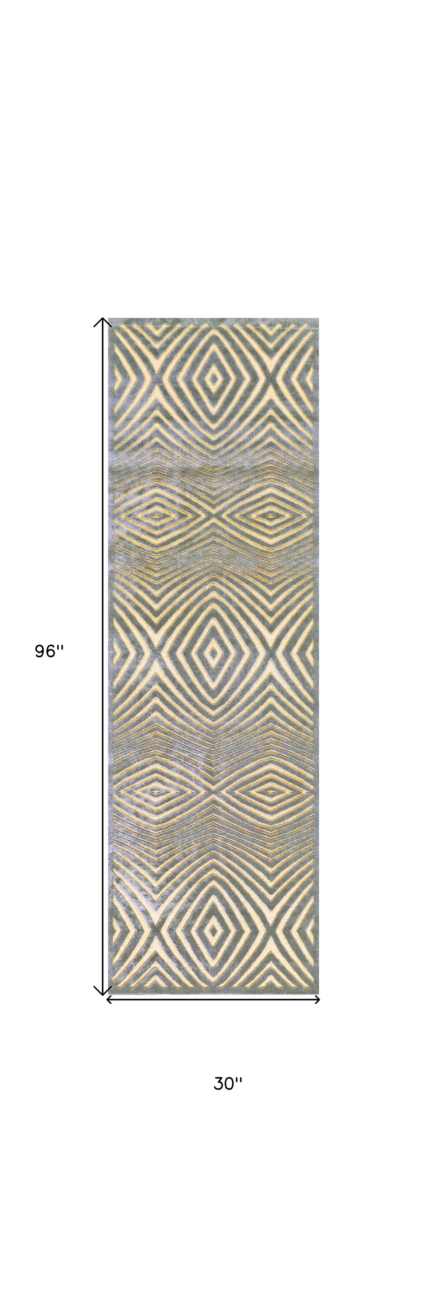 5' X 8' Tan and Gray Abstract Power Loom Area Rug