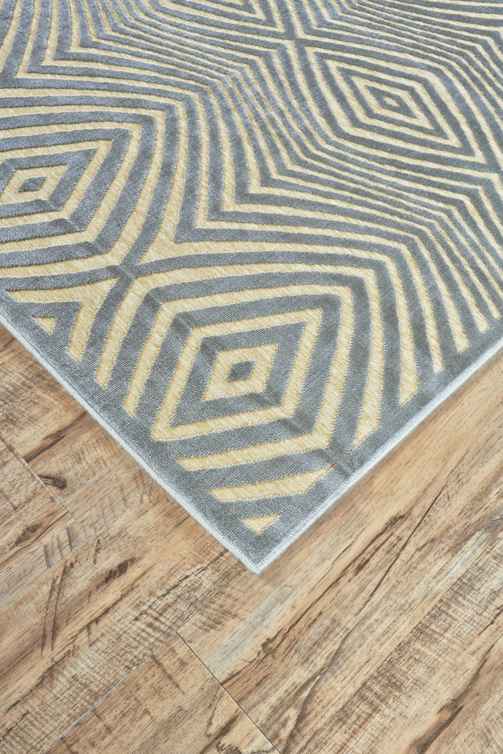 5' X 8' Tan and Gray Abstract Power Loom Area Rug