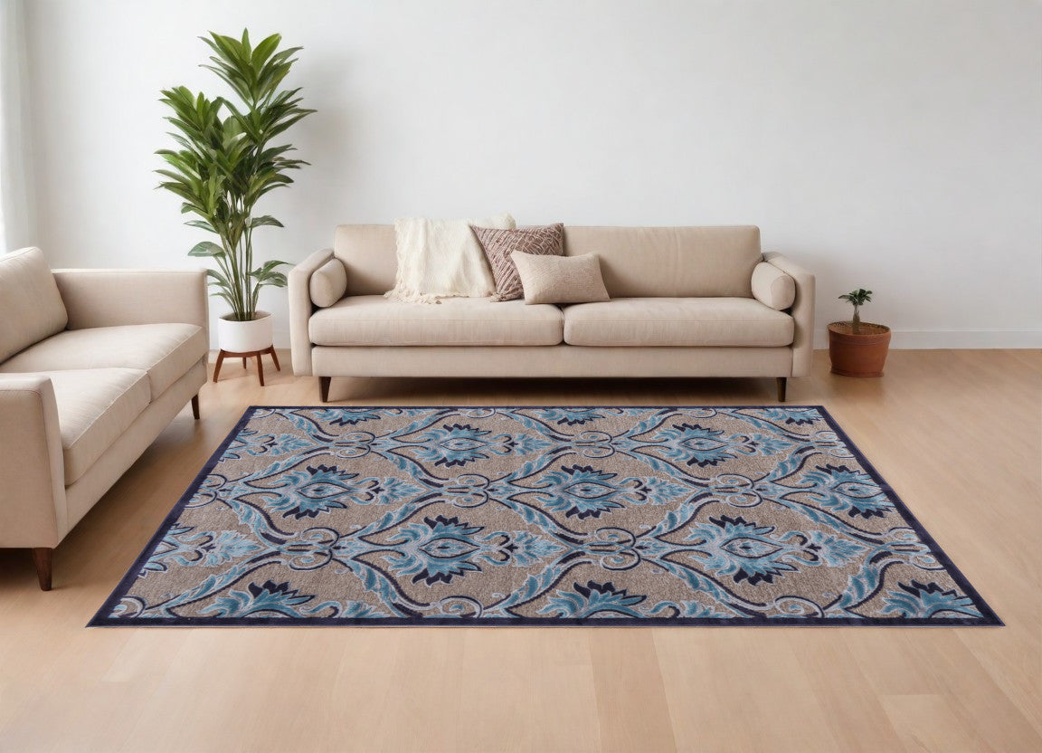 8' X 11' Tan Green and Taupe Floral Power Loom Area Rug