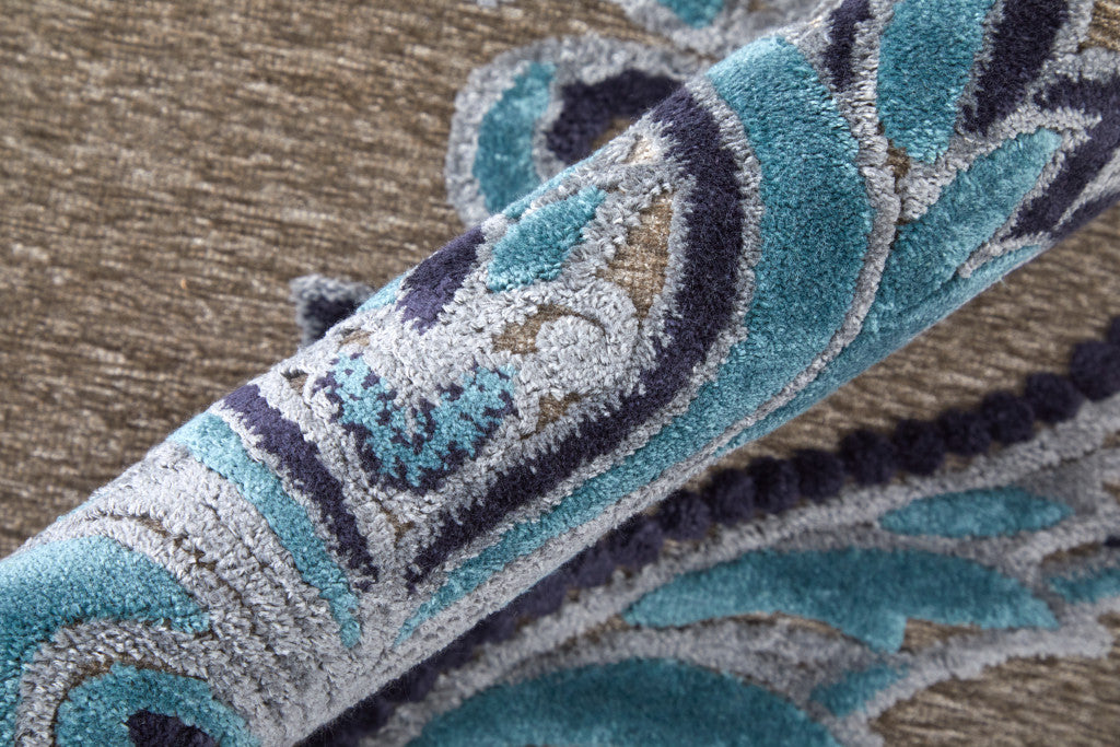 8' X 11' Tan Green and Taupe Floral Power Loom Area Rug