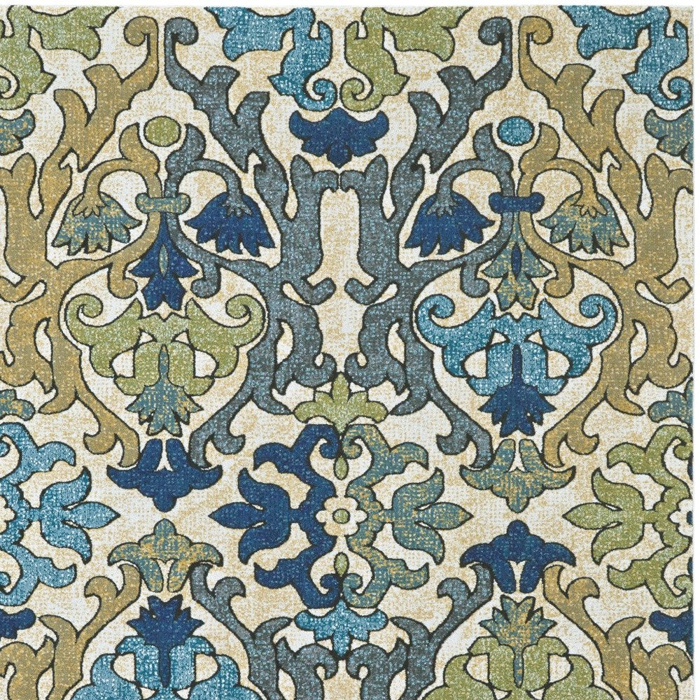 7' X 10' Green Gray and Tan Floral Power Loom Area Rug