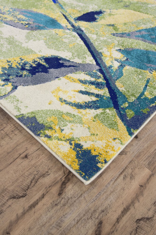 10' X 13' Green Blue and Ivory Floral Power Loom Worn Faded Area Rug