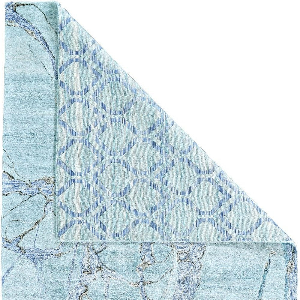 5' X 8' Blue and Ivory Abstract Hand Tufted Area Rug