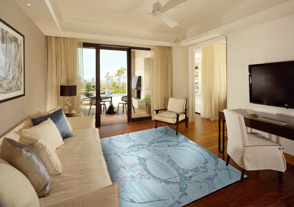 5' X 8' Blue and Ivory Abstract Hand Tufted Area Rug