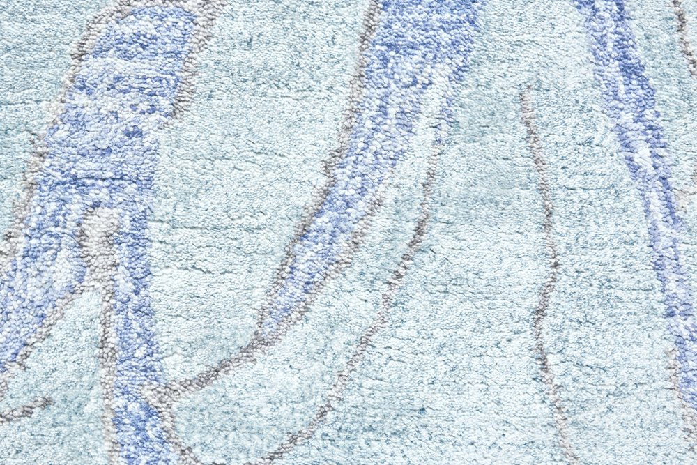 5' X 8' Blue and Ivory Abstract Hand Tufted Area Rug