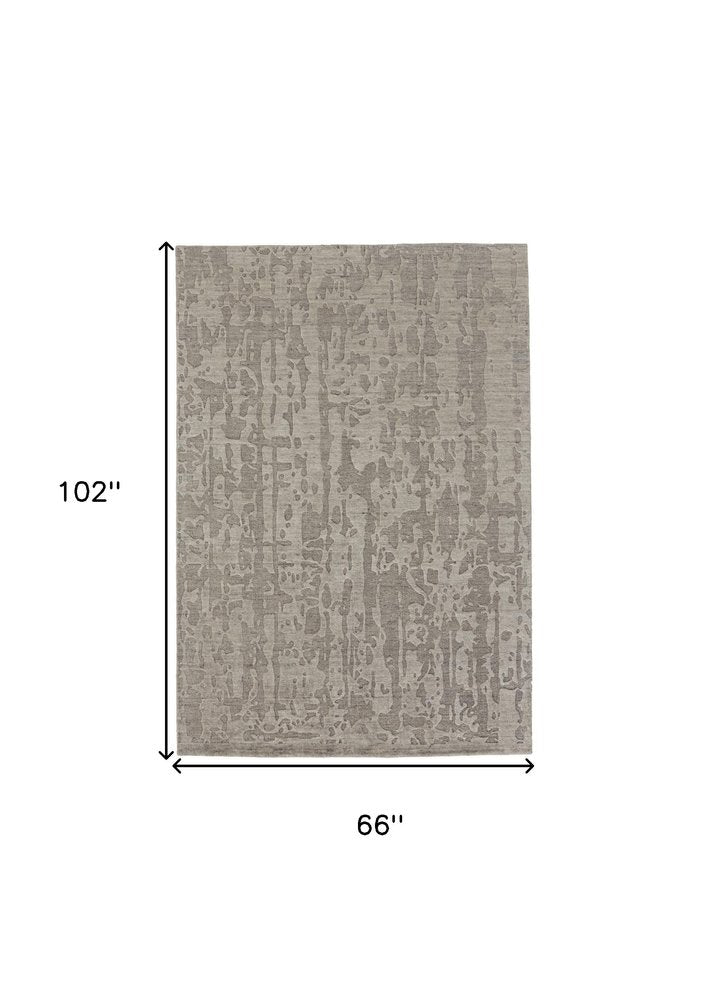 6' X 9' Taupe Abstract Hand Woven Area Rug