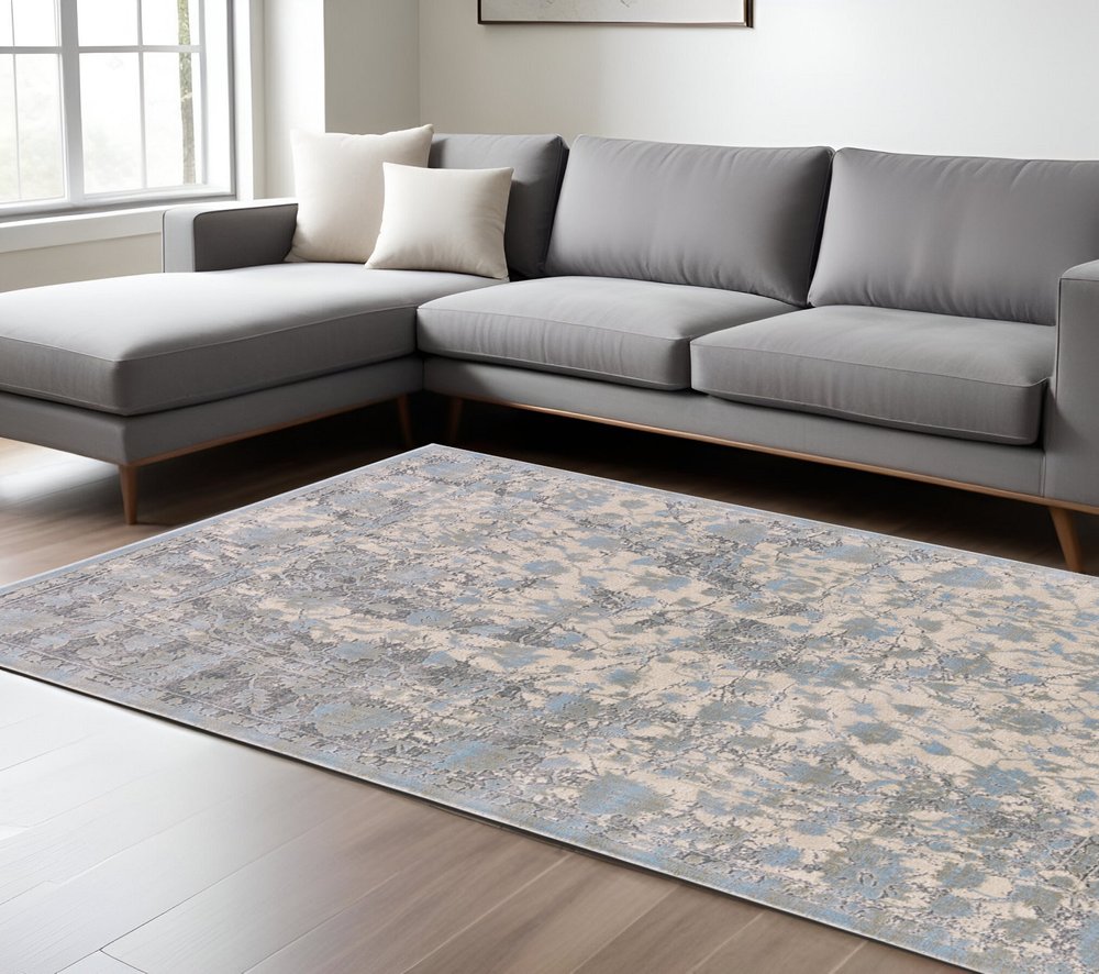 10' X 13' Ivory Taupe and Blue Abstract Power Loom Worn Faded Area Rug