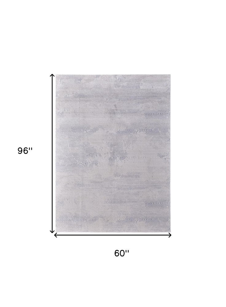 10' X 13' Gray and Ivory Abstract Power Loom Worn Faded Area Rug