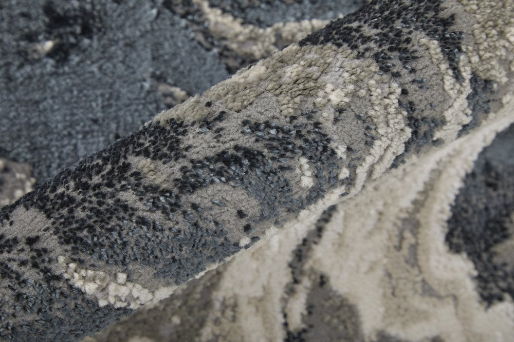 5' X 8' Ivory Black and Taupe Abstract Power Loom Area Rug