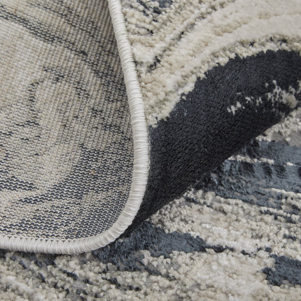 5' X 8' Ivory Black and Taupe Abstract Power Loom Area Rug