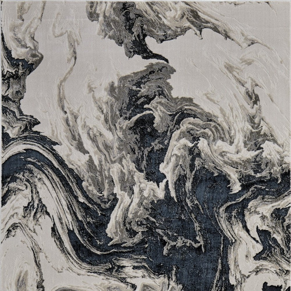 5' X 8' Ivory Black and Taupe Abstract Power Loom Area Rug