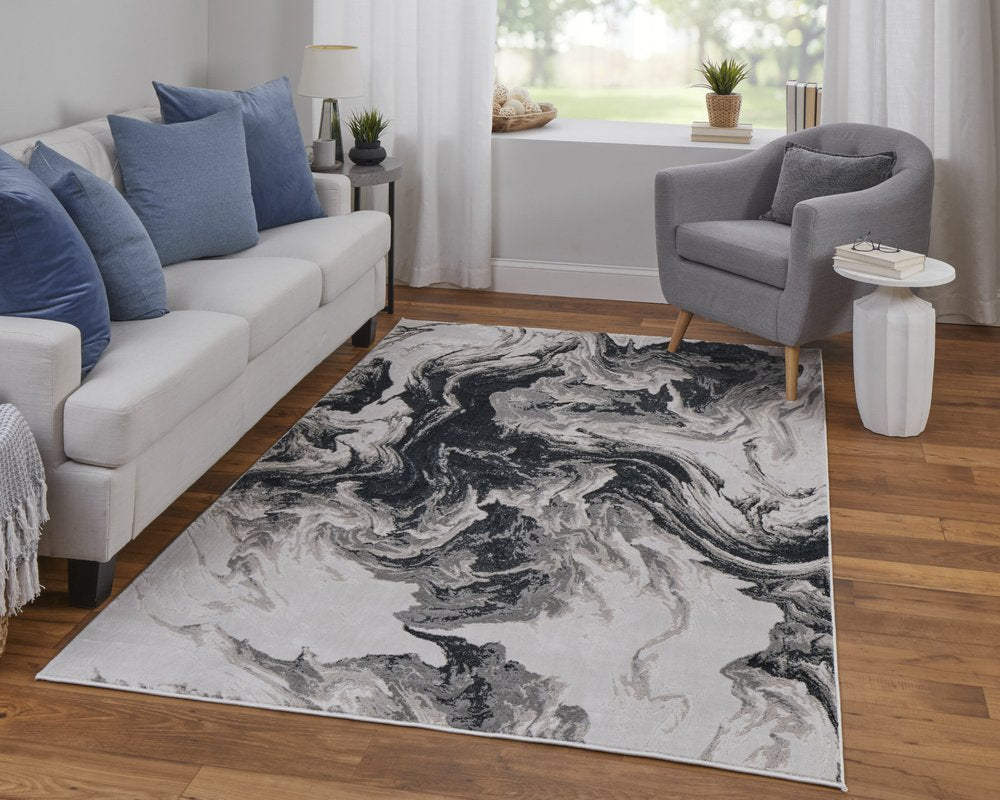 5' X 8' Ivory Black and Taupe Abstract Power Loom Area Rug
