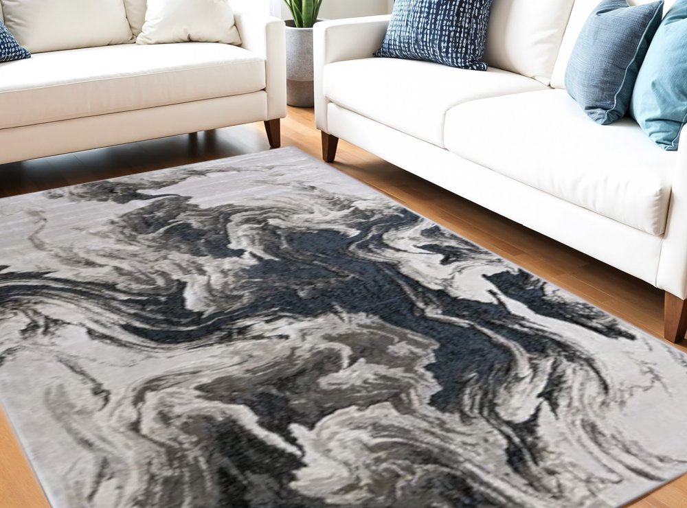 5' X 8' Ivory Black and Taupe Abstract Power Loom Area Rug