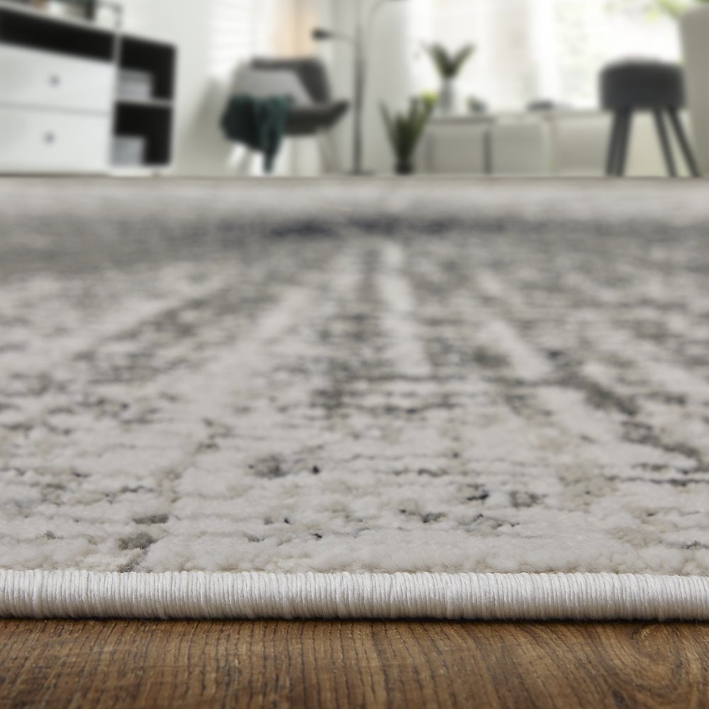 4' X 6' Gray and Ivory Abstract Power Loom Area Rug