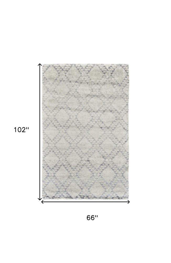 6' X 9' Gray and Ivory Geometric Hand Knotted Worn Faded Area Rug