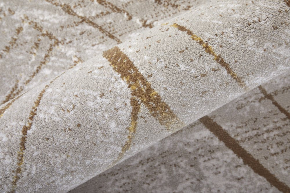 5' X 8' Silver Brown and Taupe Abstract Power Loom Area Rug