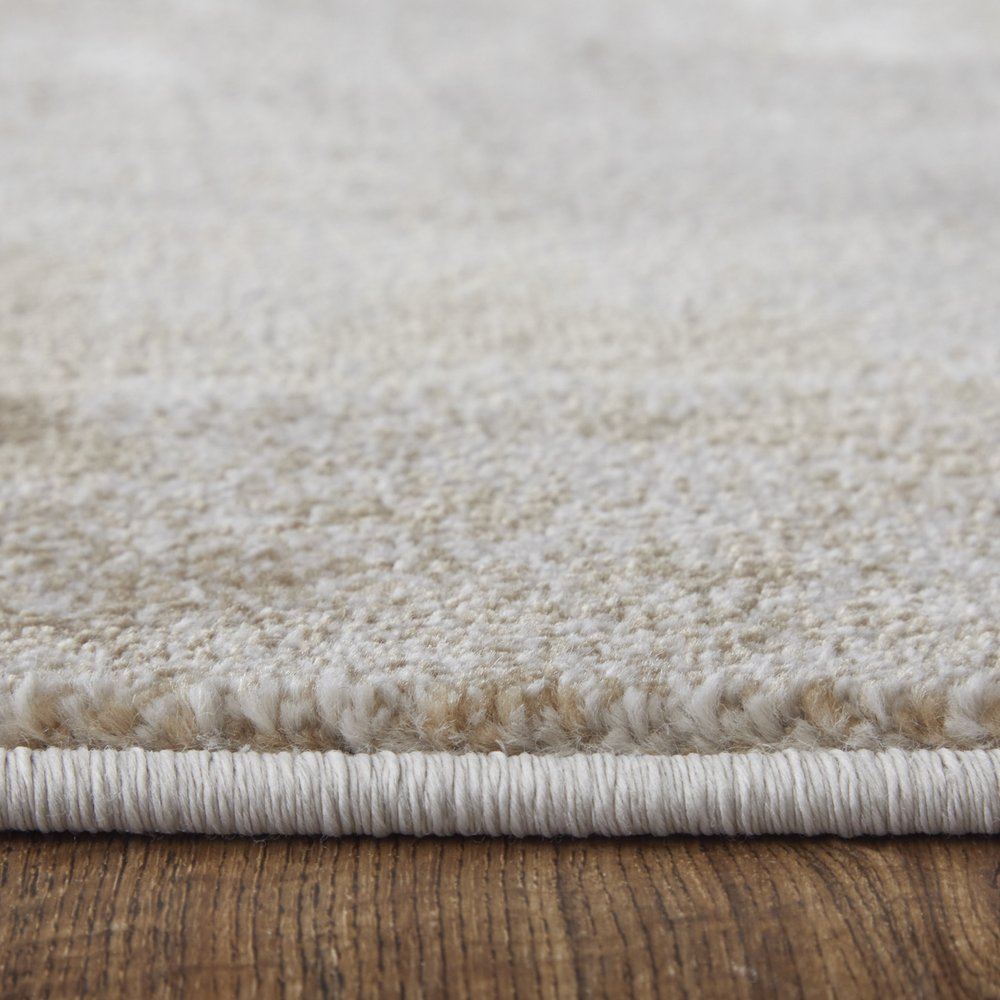 5' X 8' Tan and Ivory Abstract Power Loom Worn Faded Area Rug