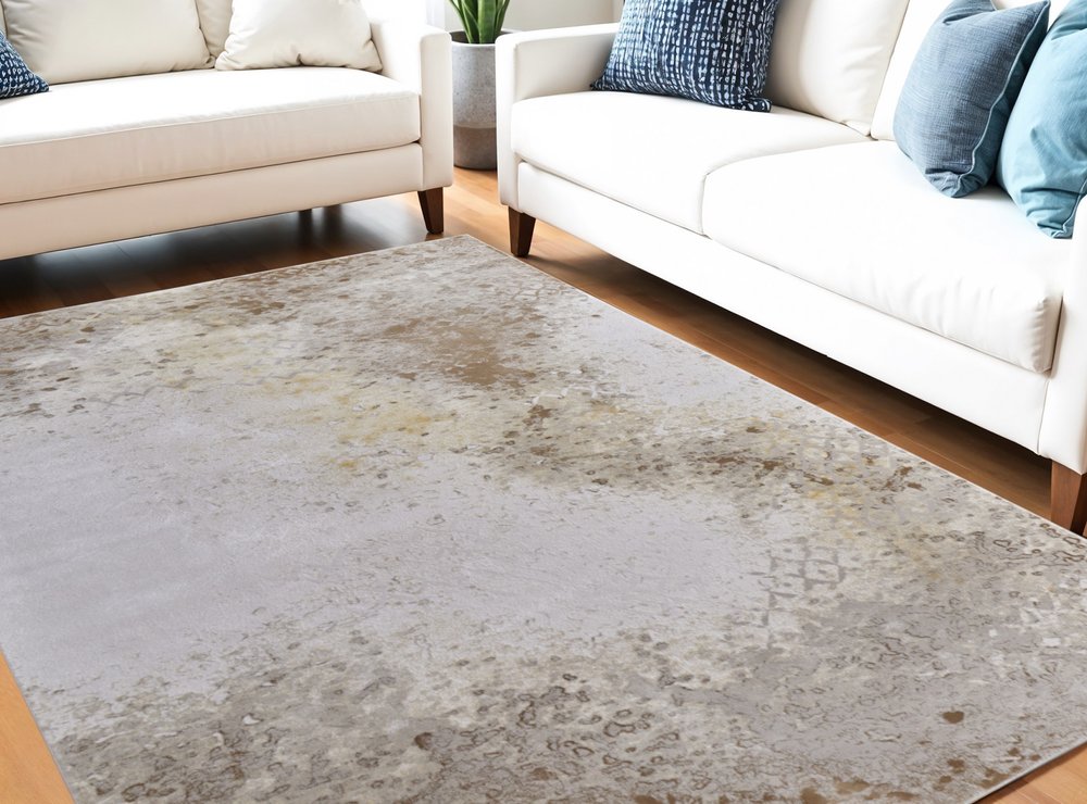 5' X 8' Tan and Ivory Abstract Power Loom Worn Faded Area Rug