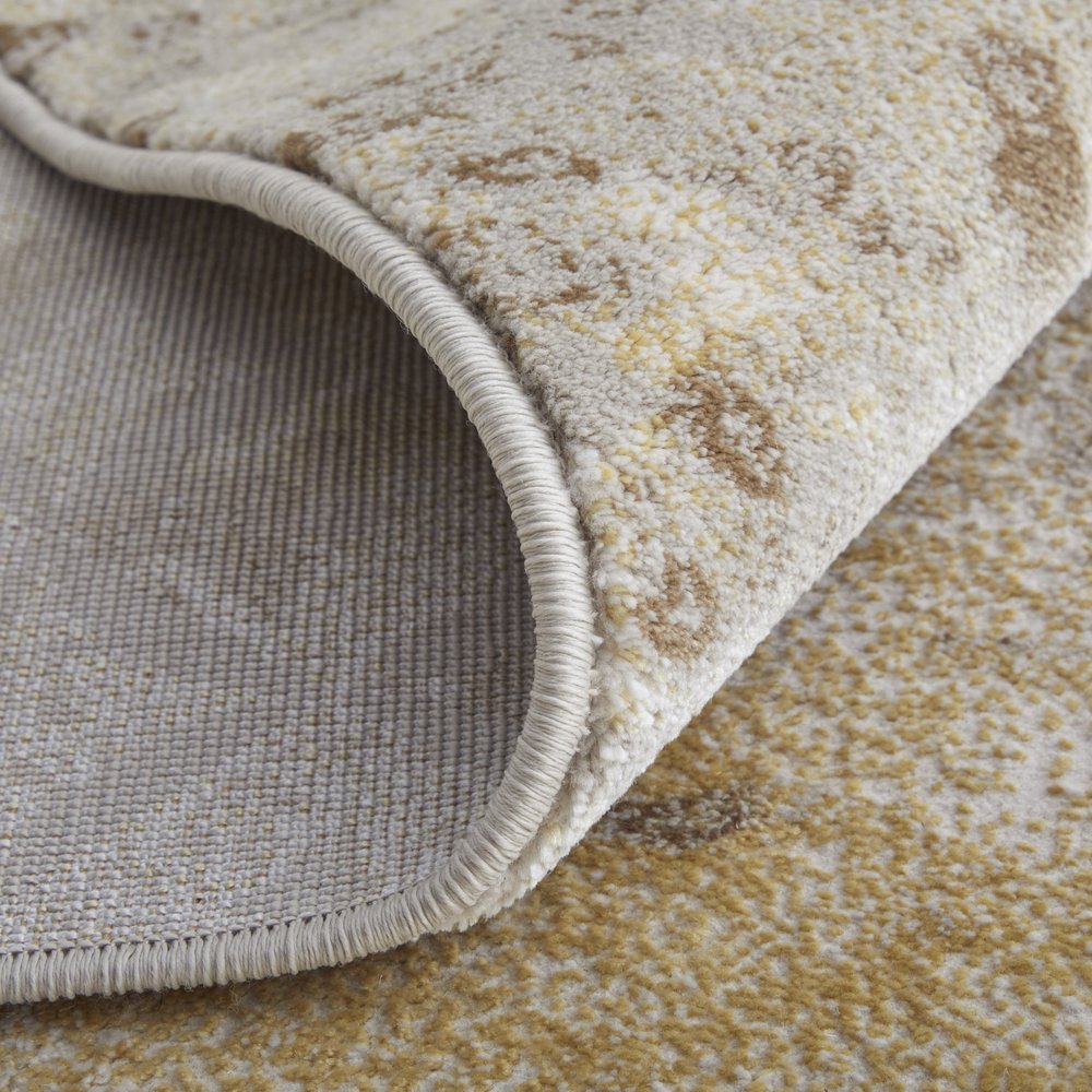 5' X 8' Tan and Ivory Abstract Power Loom Worn Faded Area Rug