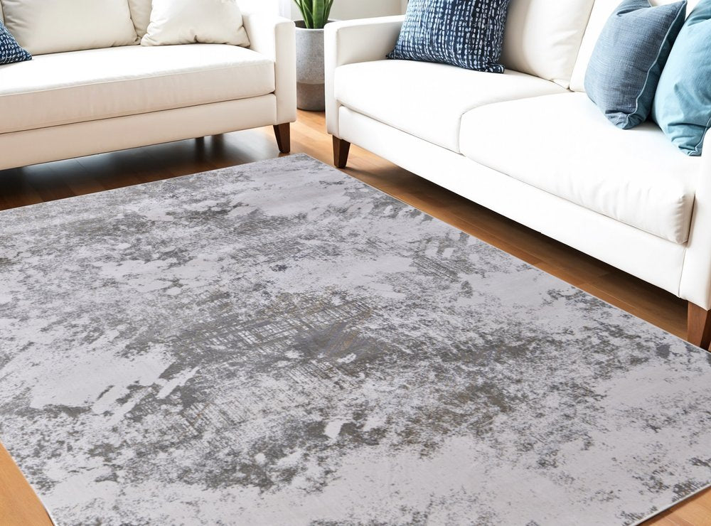 5' X 8' Gray and Silver Abstract Power Loom Worn Faded Area Rug