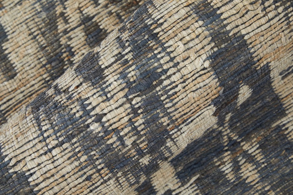 5' X 8' Tan and Gray Geometric Hand Woven Area Rug