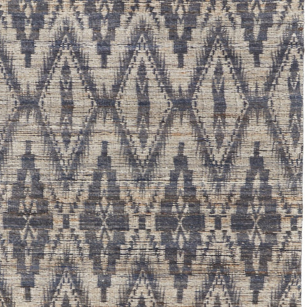 5' X 8' Tan and Gray Geometric Hand Woven Area Rug