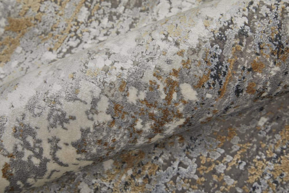 3' X 5' Gray Ivory and Gold Abstract Power Loom Area Rug With Fringe