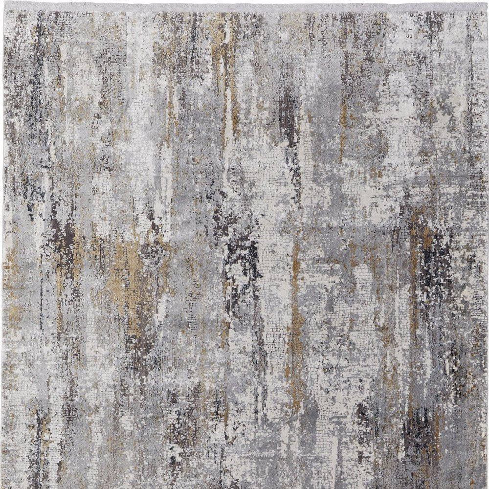 3' X 5' Gray Ivory and Gold Abstract Power Loom Area Rug With Fringe