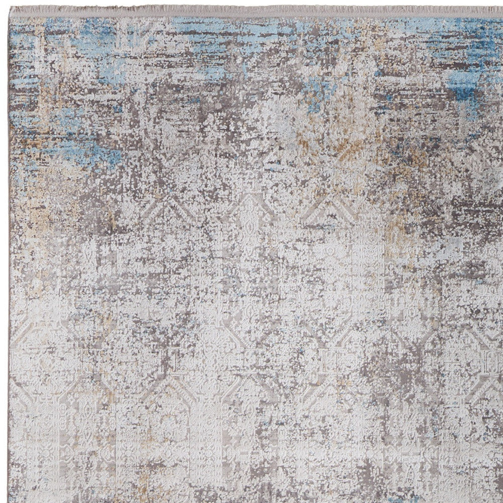 5' X 8' Ivory Gray and Blue Abstract Power Loom Area Rug With Fringe