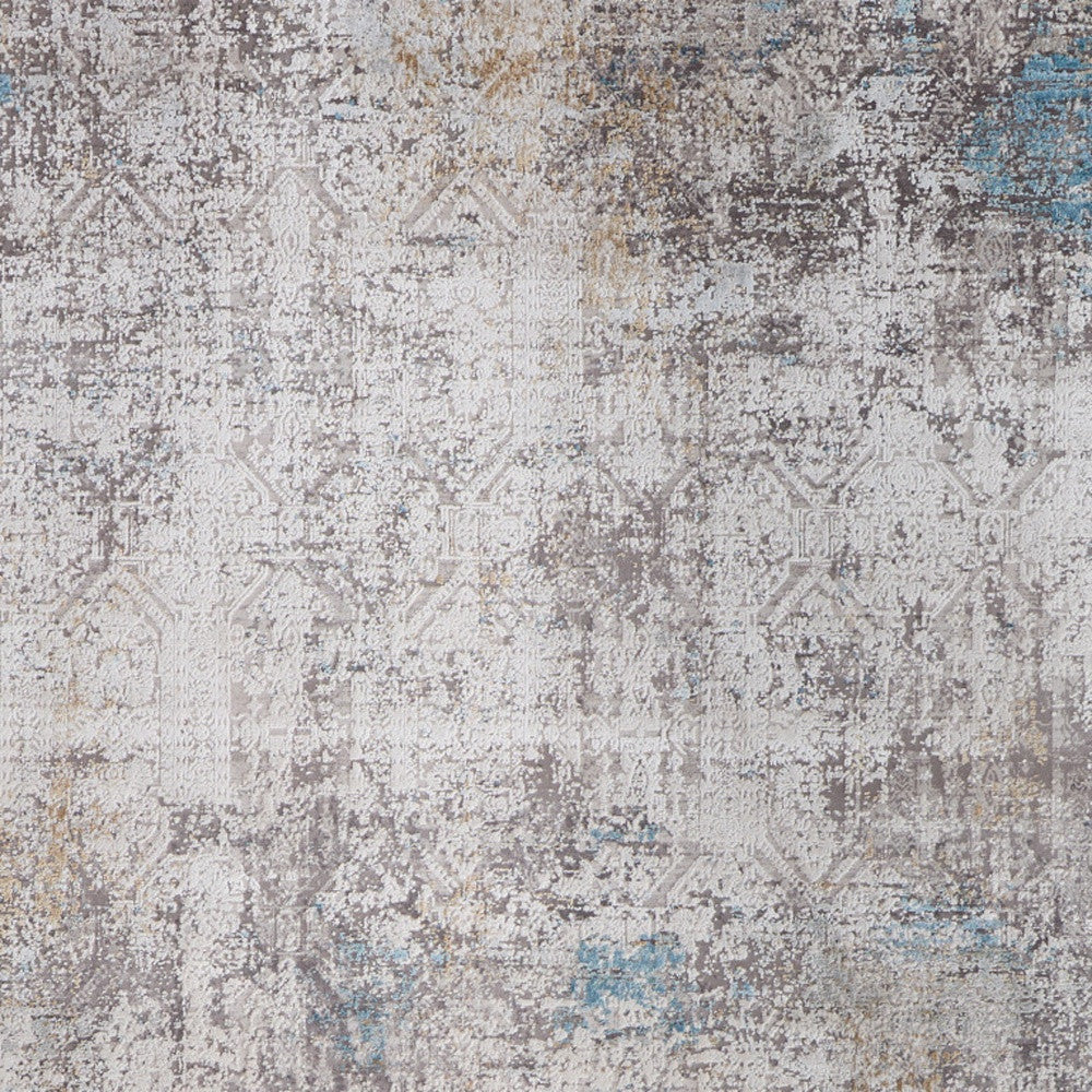 5' X 8' Ivory Gray and Blue Abstract Power Loom Area Rug With Fringe