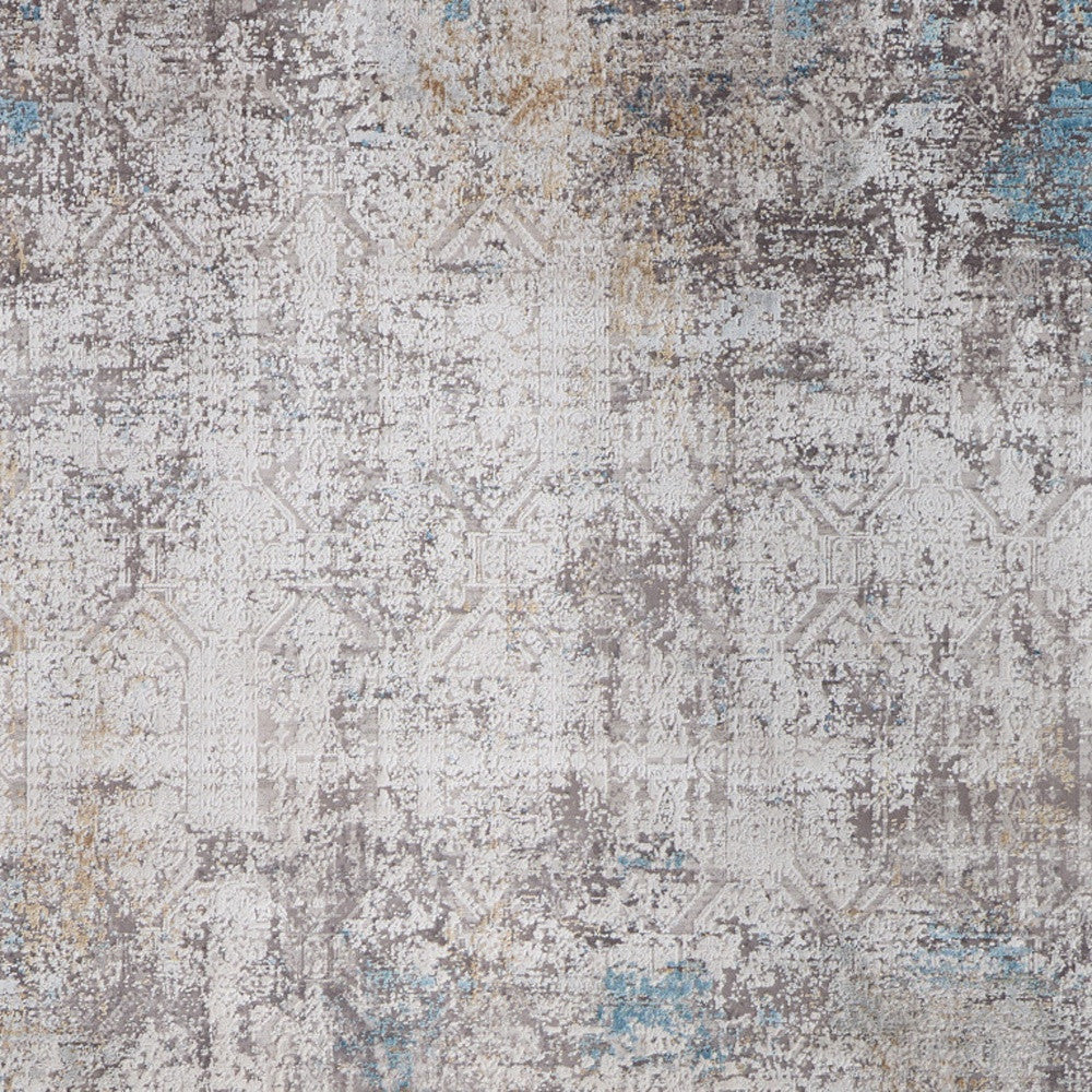 5' X 8' Ivory Gray and Blue Abstract Power Loom Area Rug With Fringe