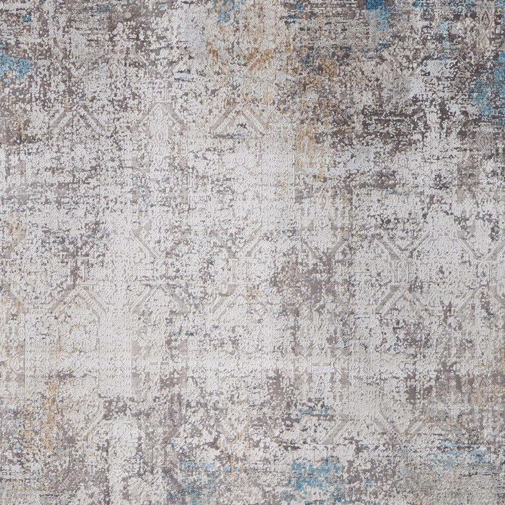 5' X 8' Ivory Gray and Blue Abstract Power Loom Area Rug With Fringe