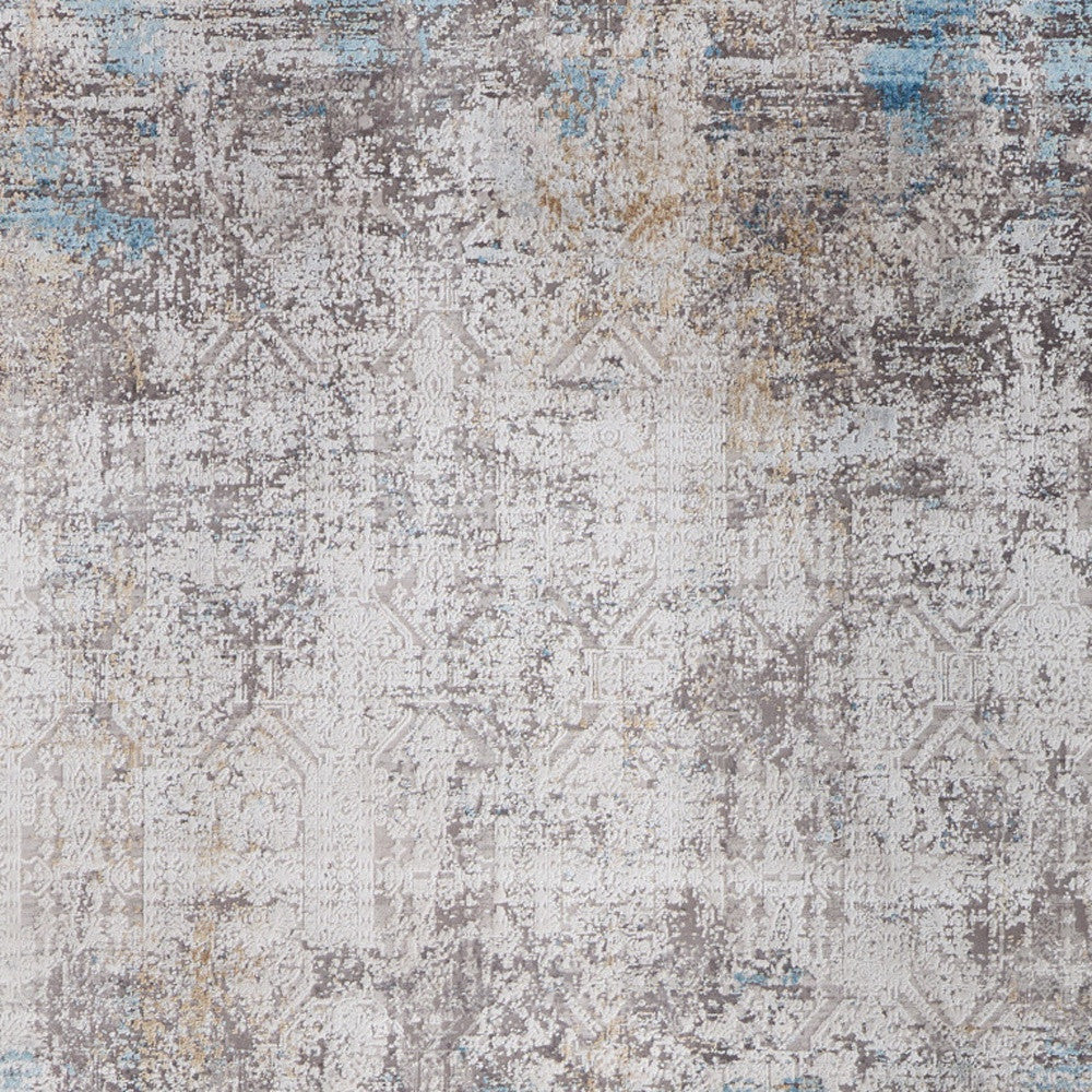 5' X 8' Ivory Gray and Blue Abstract Power Loom Area Rug With Fringe