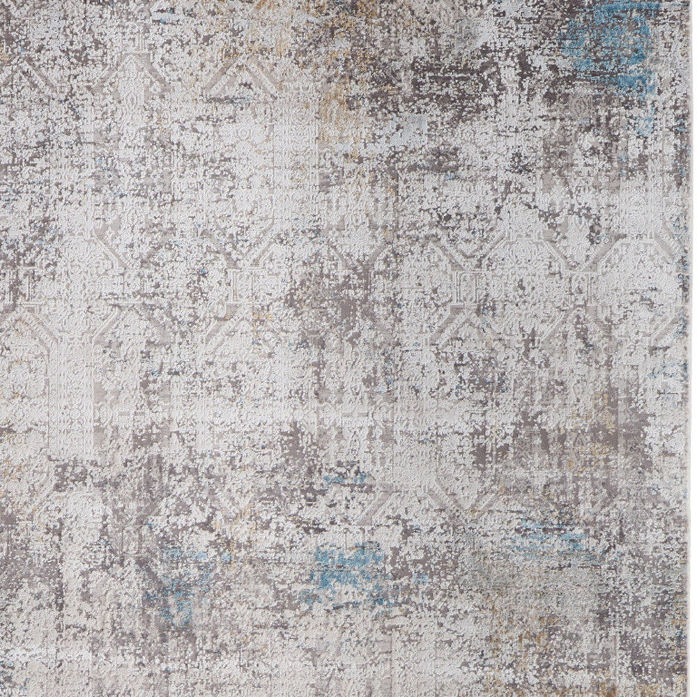 5' X 8' Ivory Gray and Blue Abstract Power Loom Area Rug With Fringe