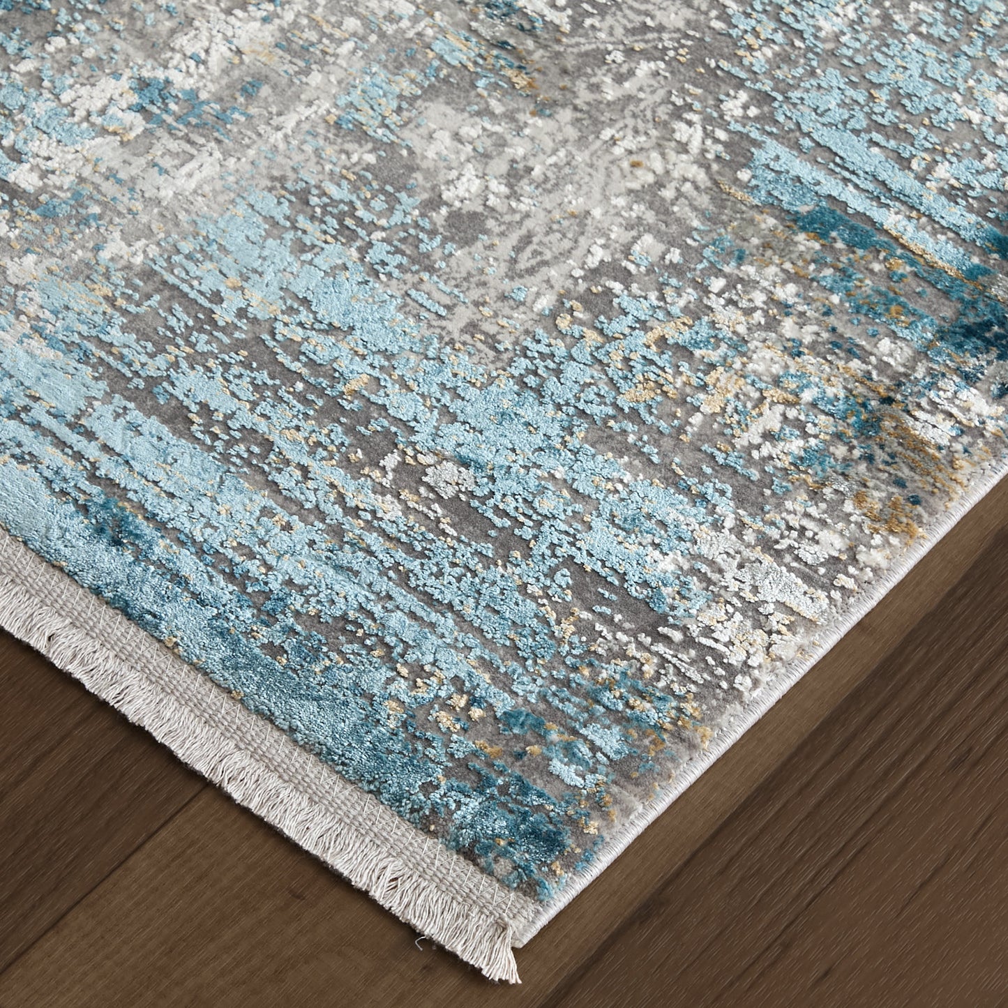 5' X 8' Ivory Gray and Blue Abstract Power Loom Area Rug With Fringe
