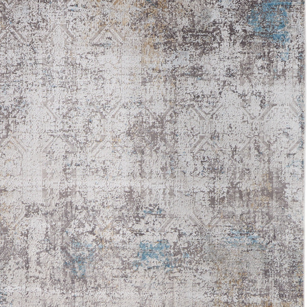 5' X 8' Ivory Gray and Blue Abstract Power Loom Area Rug With Fringe