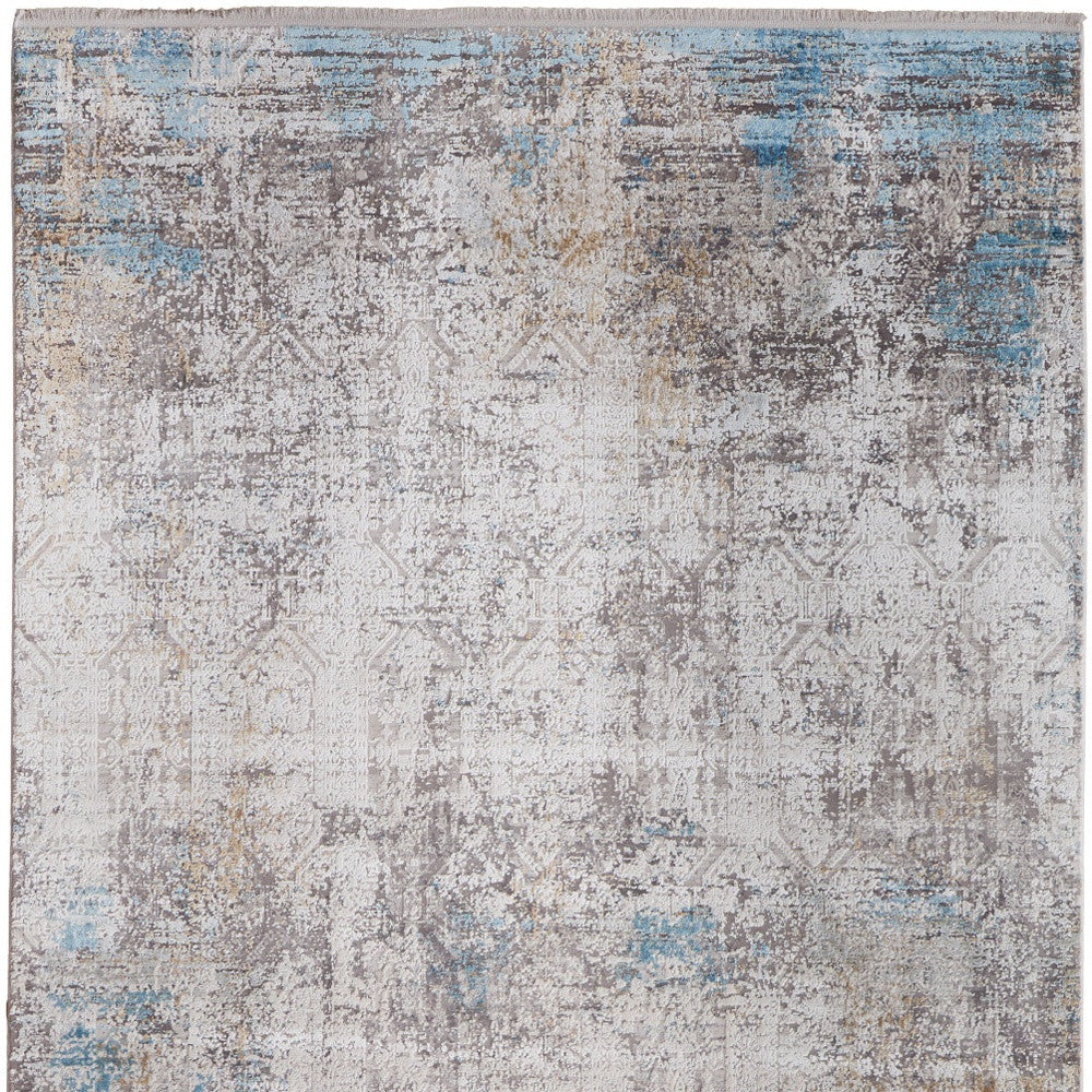 5' X 8' Ivory Gray and Blue Abstract Power Loom Area Rug With Fringe