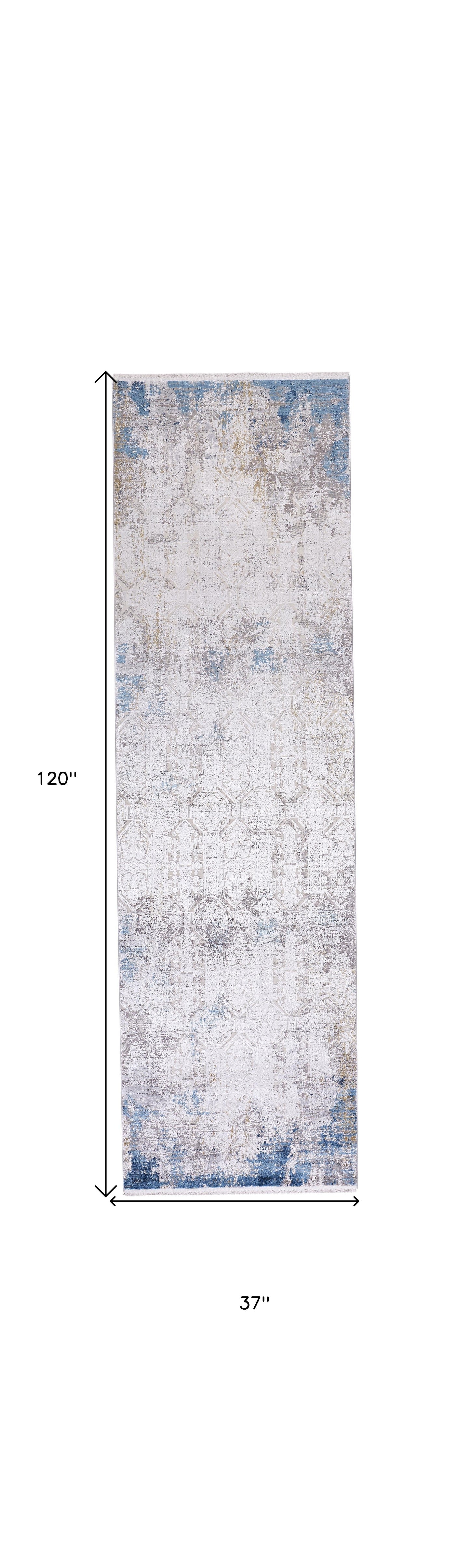 5' X 8' Ivory Gray and Blue Abstract Power Loom Area Rug With Fringe