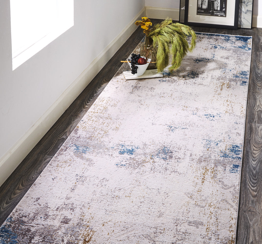 5' X 8' Ivory Gray and Blue Abstract Power Loom Area Rug With Fringe