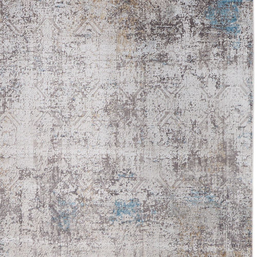 5' X 8' Ivory Gray and Blue Abstract Power Loom Area Rug With Fringe