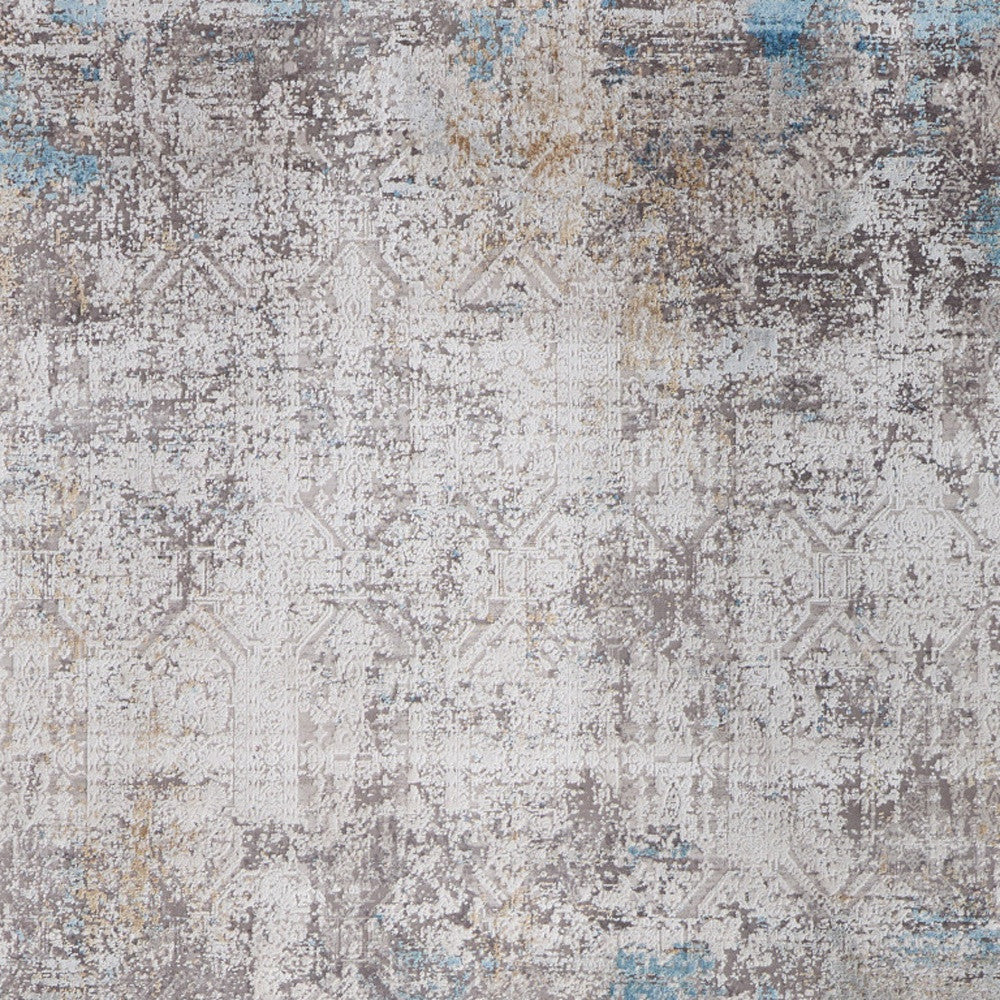 5' X 8' Ivory Gray and Blue Abstract Power Loom Area Rug With Fringe