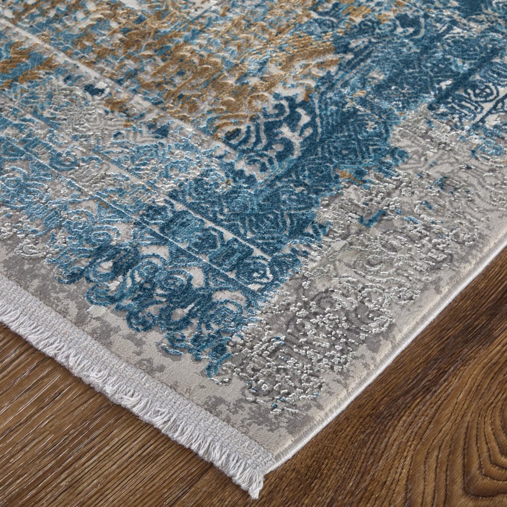 3' X 5' Blue Gold and Gray Abstract Power Loom Area Rug With Fringe