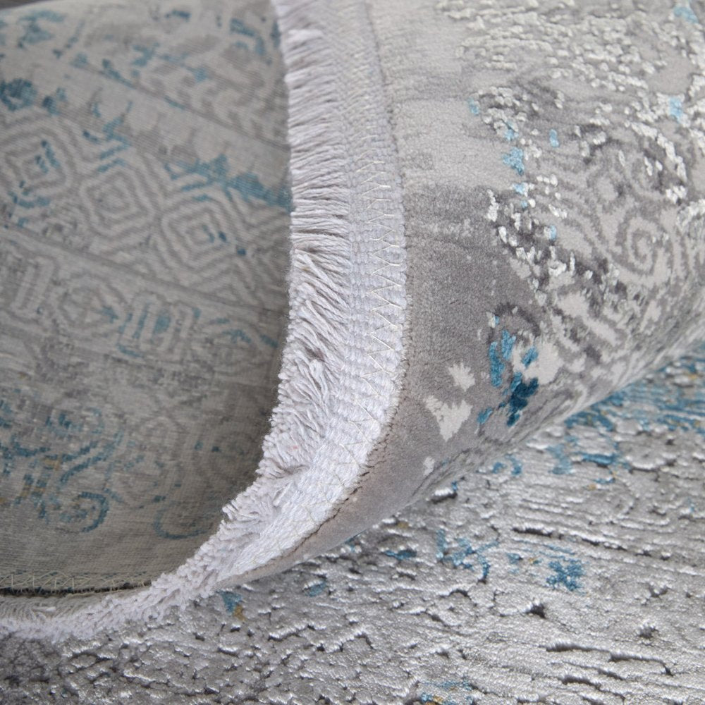 3' X 5' Blue Gold and Gray Abstract Power Loom Area Rug With Fringe