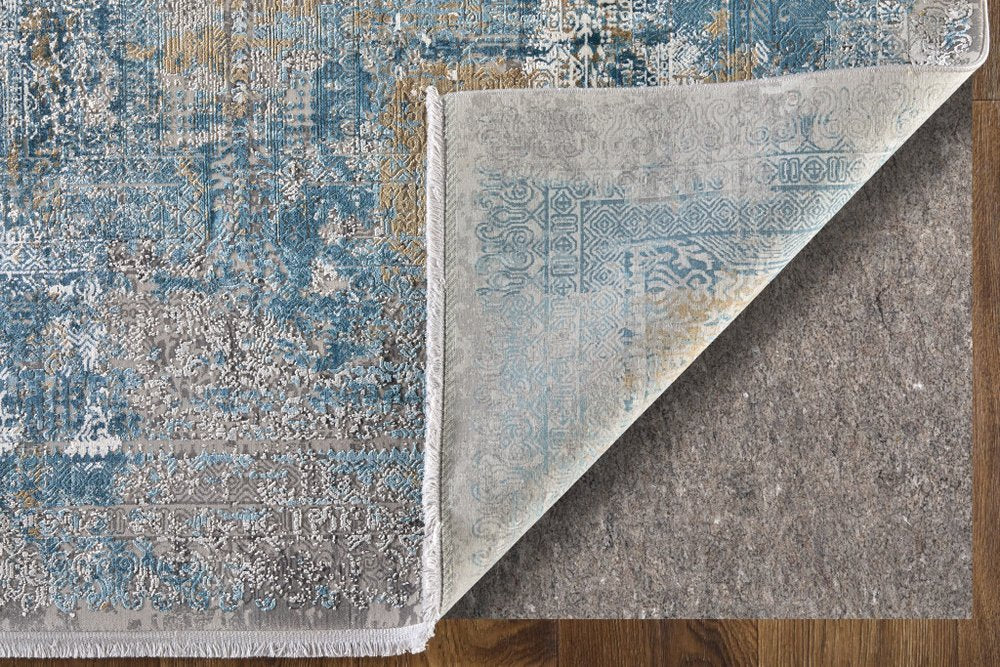 3' X 5' Blue Gold and Gray Abstract Power Loom Area Rug With Fringe
