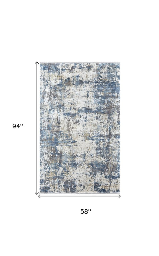 3' X 5' Ivory Tan and Blue Abstract Power Loom Area Rug With Fringe