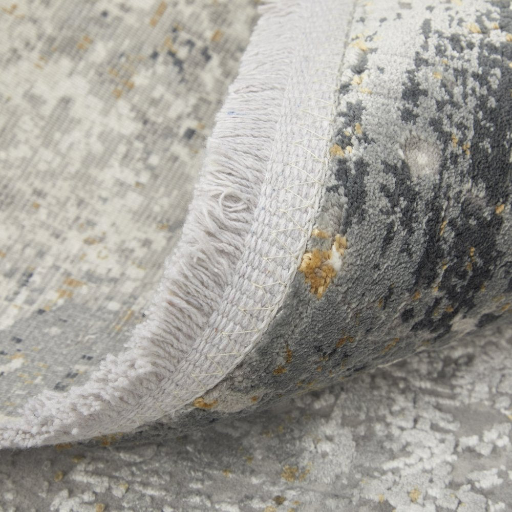 3' X 5' Ivory Taupe and Gray Abstract Power Loom Distressed Area Rug With Fringe