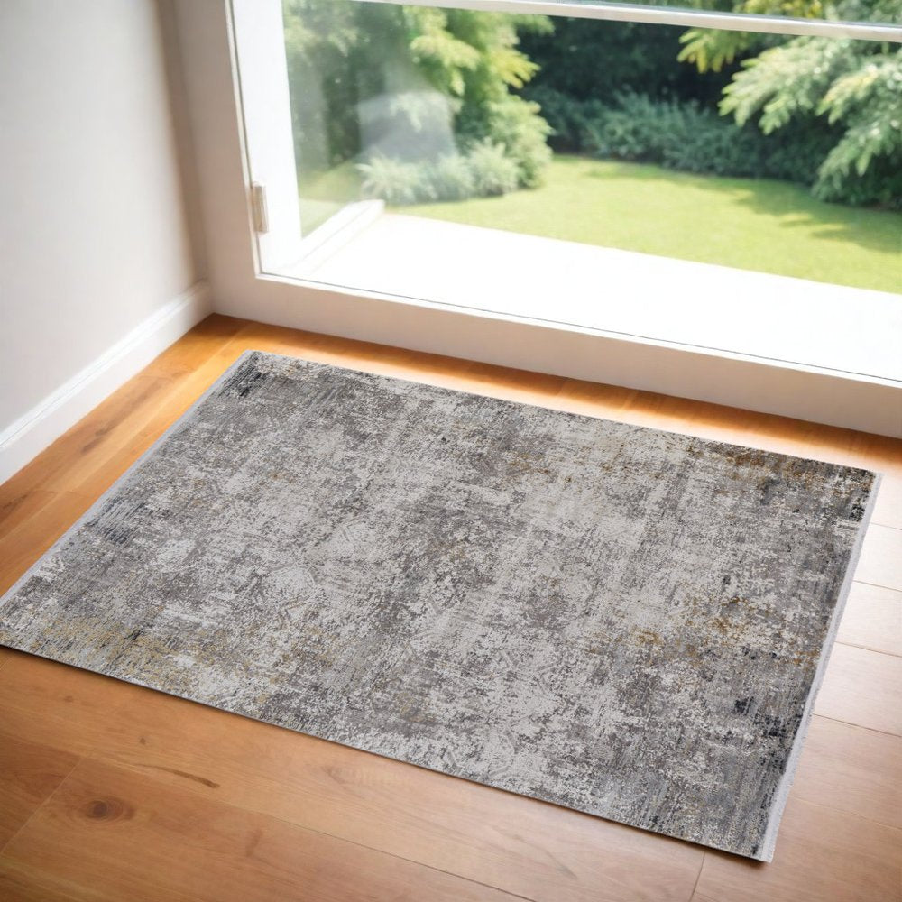 3' X 5' Ivory Taupe and Gray Abstract Power Loom Distressed Area Rug With Fringe