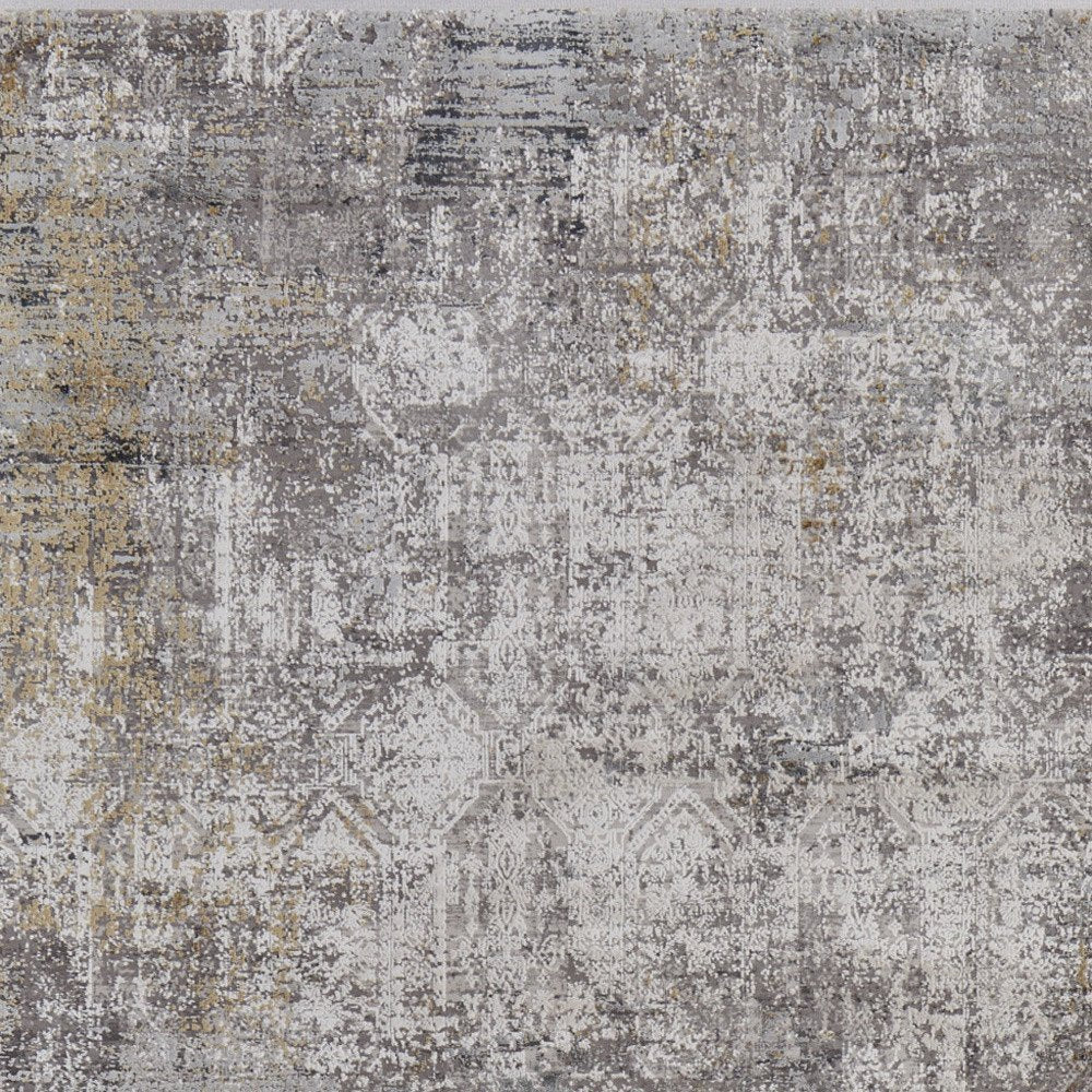 3' X 5' Ivory Taupe and Gray Abstract Power Loom Distressed Area Rug With Fringe